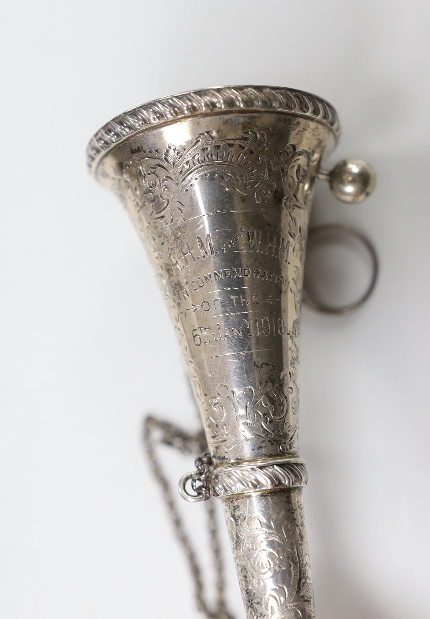 A late Victorian chased silver posy holder, by George Unite, Birmingham, 1899, with later engraved inscription, 14.1cm.